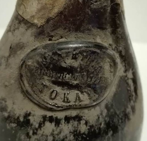 Applied glass seal lettered TOKAY, the upper line obscured by cellar deposit