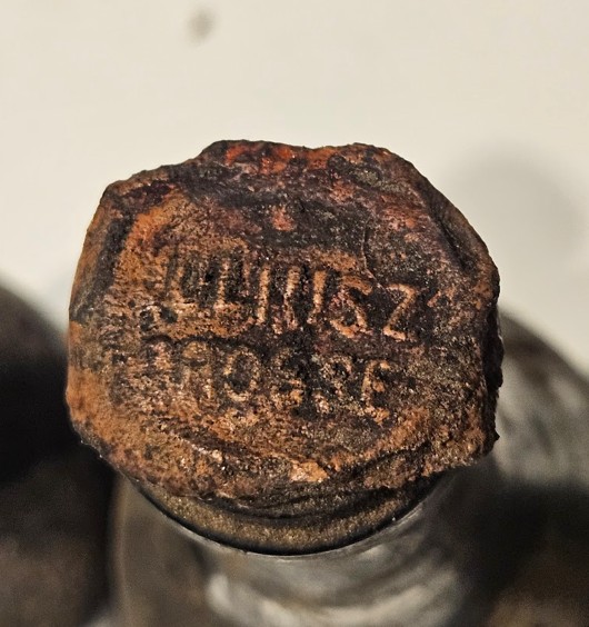 Wax seal on the cork, impressed JULIUSZ GROSSE