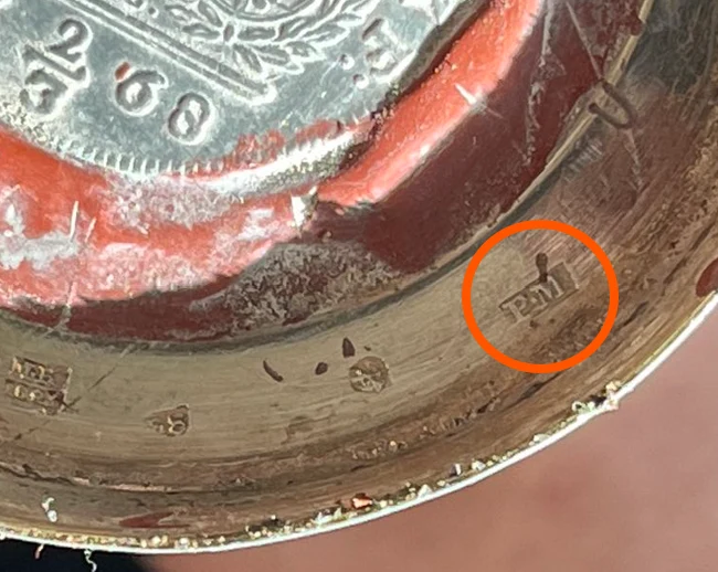 The foot underside: the PM mark, 84 and the tsarist assay mark