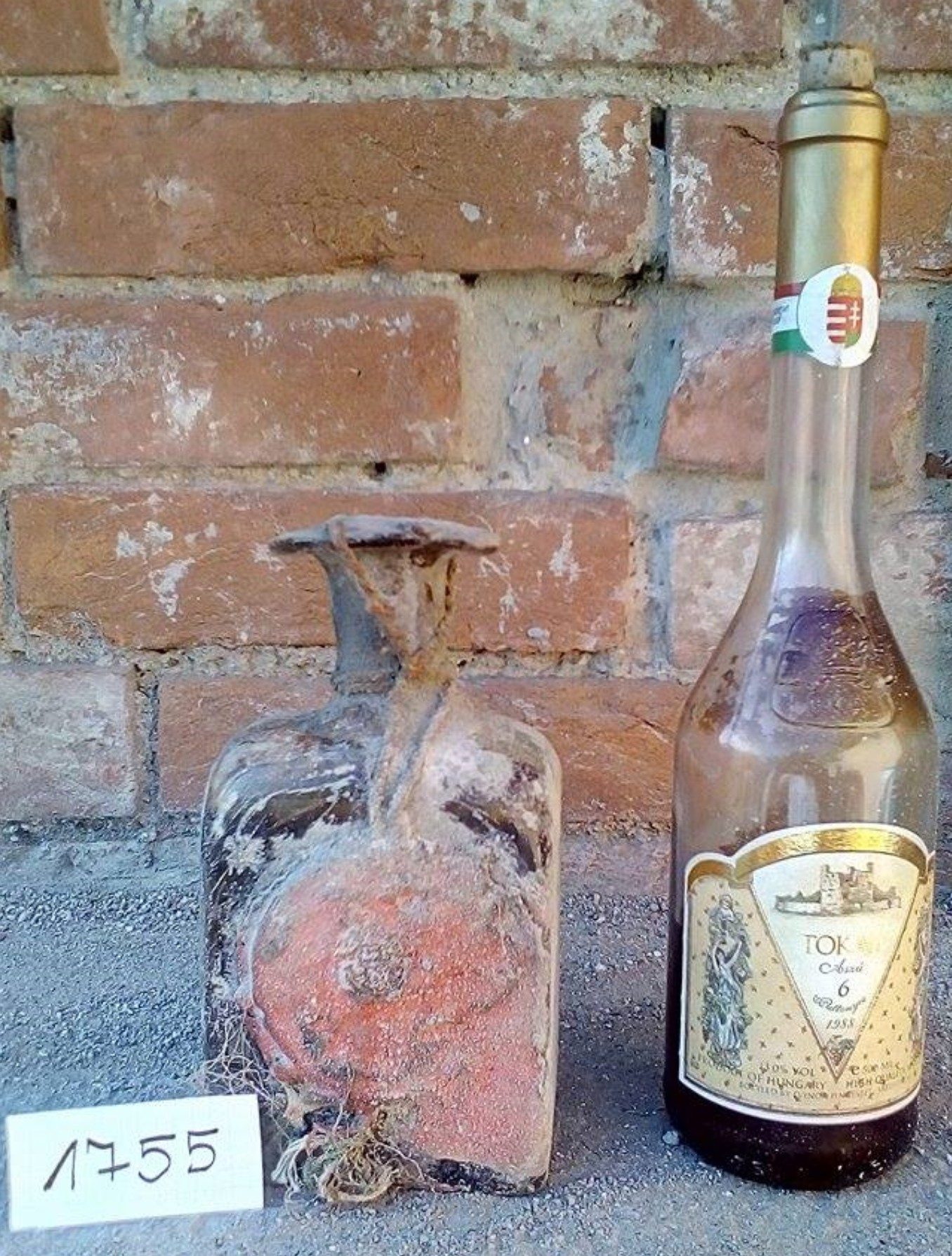 The flask beside a modern 500 ml Tokaji bottle for scale