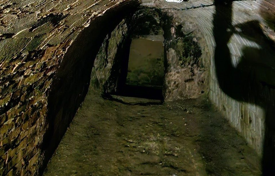 Locating a cellar entrance by torchlight