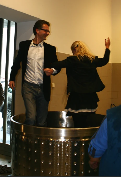 Treading grapes in a stainless steel vat