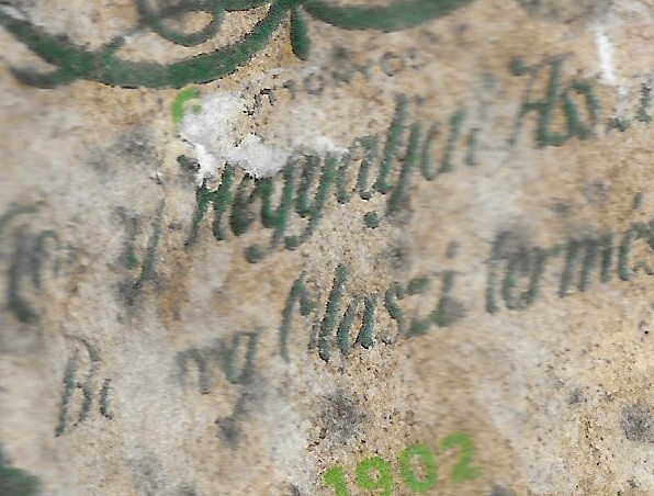 Green painted cellar inscription with the year 1902